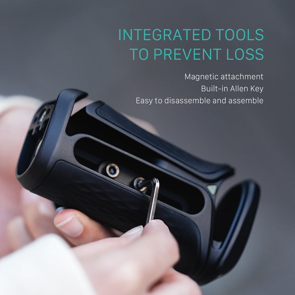 Tilta Xeno Side Handle with dual 1/4"-20 screw mount in black, featuring an ergonomic non-slip silicone grip and a cold shoe receiver for camera cage mounting.