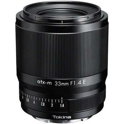 Tokina atx-m 33mm f/1.4 for Sony E. Fast standard prime with f/1.4, sharp optics, smooth bokeh, and compact design for portraits and street photography.