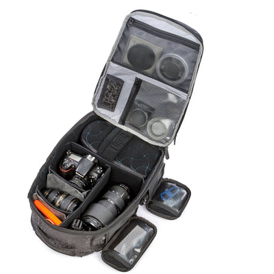 Valkyrie camera backpack with adjustable dividers, tripod holder, water-resistant fabric, and padded interior for photography gear
