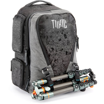 Valkyrie camera backpack with adjustable dividers, tripod holder, water-resistant fabric, and padded interior for photography gear

