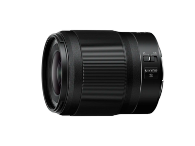 Black camera lens with 'Nikon' branding on a white background