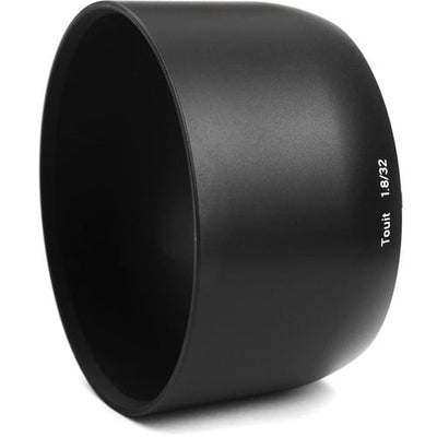 Zeiss Touit 32mm f/1.8 for Fujifilm X. APS-C standard prime with f/1.8 aperture, sharp optics, natural colours, and lightweight portability.