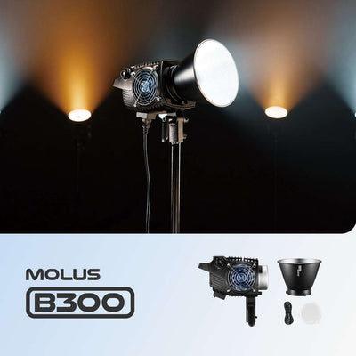 Zhiyun Molus B300 300W bi-color LED monolight — compact black fixture with Bowens mount, integrated AC power source, and cooling vents.