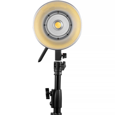 Zhiyun Molus B200 bi-color LED monolight with reflector, mounted on a light stand.
