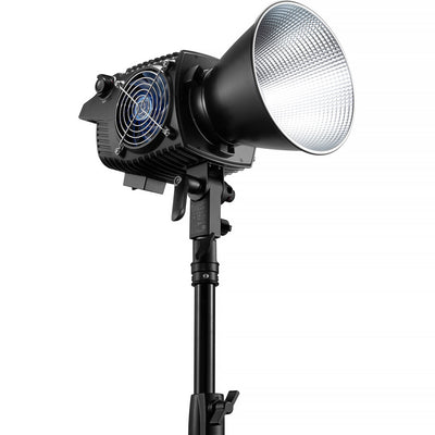 Zhiyun Molus B300 300W bi-color LED monolight — compact black fixture with Bowens mount, integrated AC power source, and cooling vents.